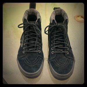 Black suede high tops Vans